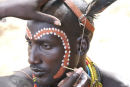 Hamer man having his face painted